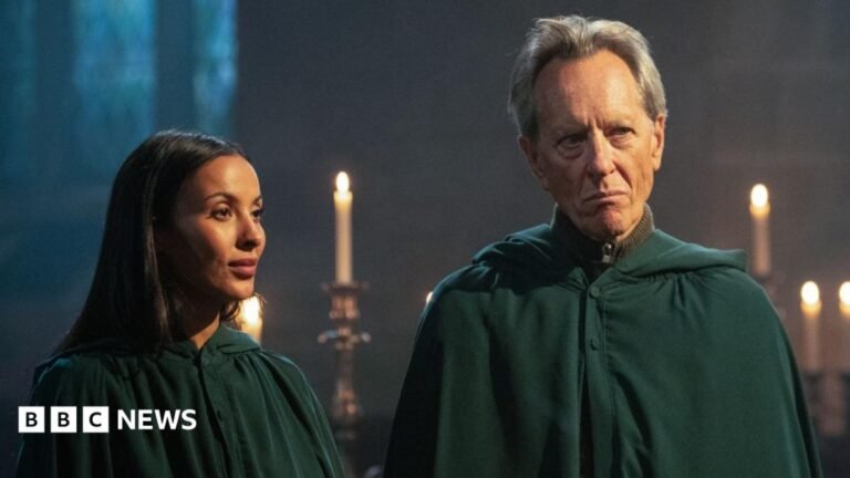 Celebrity Traitors claim their first victim as Richard E Grant tries to save his skin Maya Jama and Richard E Grant wearing the traitors' green cloak