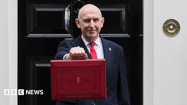 Chris Mason: Budget felt cautious despite range of small measures John Healy stands in front of Number 11 Downing Street while holding the signature red Budget box.