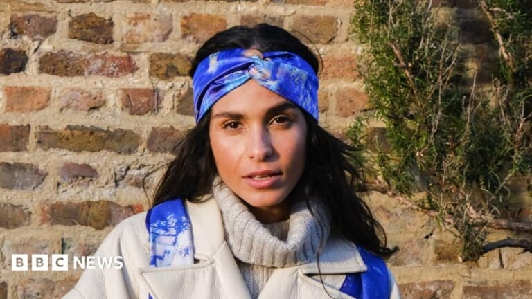 ‘I rage and I don’t care’: Why women are reclaiming their anger Chess Galea is looking straight at the camera wearing a blue scarf, and a beige coat and polo neck.