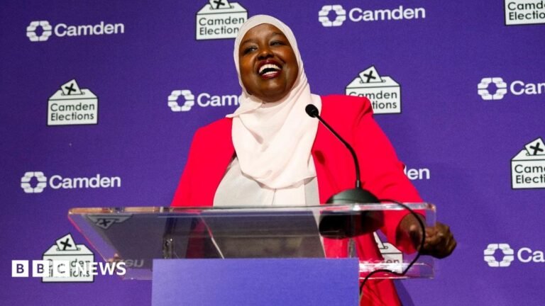 Labour sees off Green challenge to win Holborn by-election Labour's Sagal Abdi-Wali smiles as stands behind a podium in front of a purple backdrop reading "Camden elects", following her by-election win.