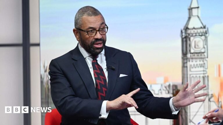 Mayor of London race 2028: Conservatives seek party’s nomination A middle aged man with dark hair and a short dark beard, being interviewed in a TV studio, he is wearing a dark blue suit white shirt and black and red patterned tie.