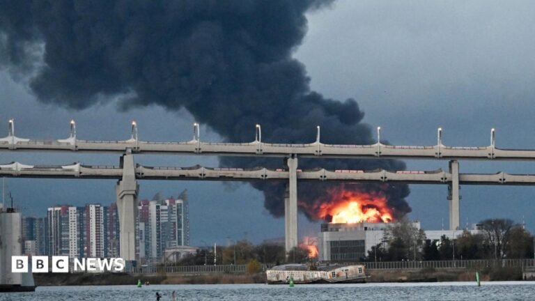 Oil facilities hit in deadly overnight attack on St Petersburg Flames emerge and smoke rises from St Petersburg's oil terminal following an aerial attack there on 18 October, 2026