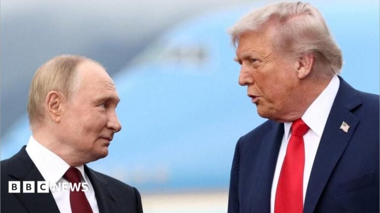 Trump waives several Russia sanctions as row with Zelensky intensifies Trump and Putin speaking during a visit to Alaska