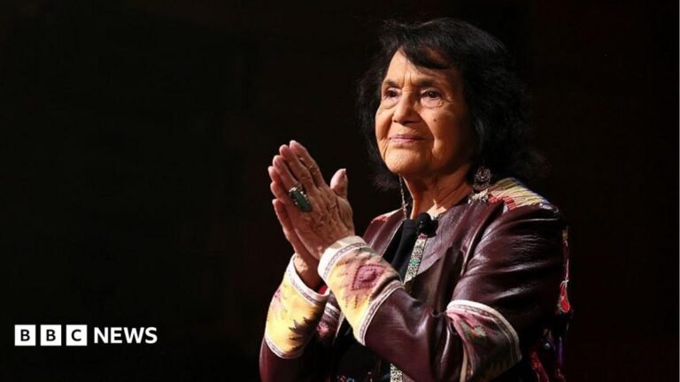 US civil rights leader Dolores Huerta dies aged 96 Dolores Huerta slightly turned to her right with her hands in a prayer position and a large turquoise ring on her right hand wears a brown leather jacket and long earrings