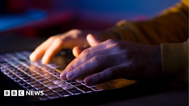 Websites taken down worldwide as critical PHP cyber-security update issued Somebody holding up a smart-phone in their right hand. The screen is black with 'Revolut' written in white letters.